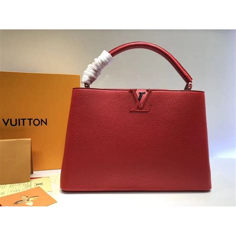 louis vuitton capucines mm m48864 fake|louis vuitton capucines bag font.